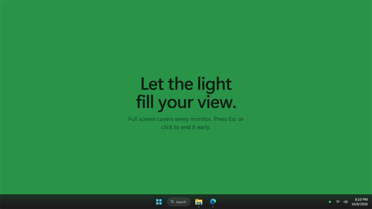 A soft green light fills your screen, then fades out on its own.